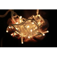 Гирлянда уличная LUMION нить 200LED 10m 230V теплый белый/белый IP44 EN